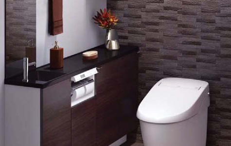 壁や手洗い場の素材にこだわった高級感のあるトイレ
